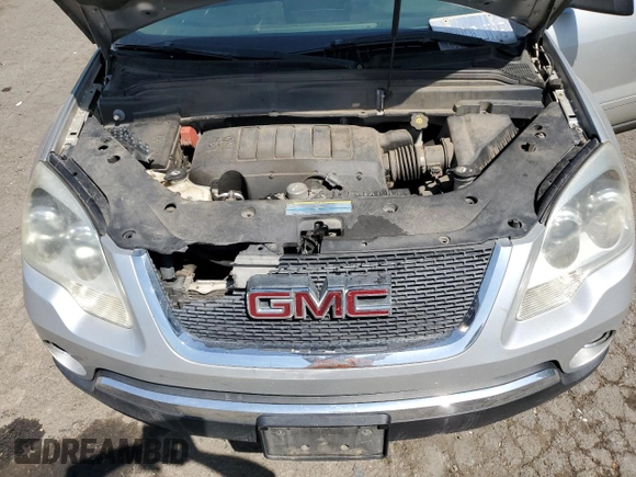 2010 GMC Acadia SLE z VIN 1GKLVLEDXAJ264872, wystawiony jako Copart lot #53799985 z przebiegiem 181 110 mil mil oraz Szkoda całkowita • Salvage title. Historia ofert i sprzedaży dostępna na DreamBid. Obrazek 12.