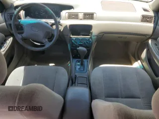 2001 Toyota Camry CE with VIN 4T1BG22K11U106302, listed as a Copart auction lot 55986065 with 151,932 mi miles and Salvage Title. Bid and sale history available at DreamBid. Image 8.