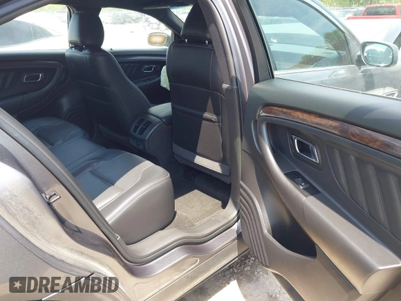 2013 Ford Taurus Limited with VIN 1FAHP2F87DG101059, listed as a IAAI auction lot 42024526 with 105,668 mi miles and . Bid and sale history available at DreamBid. Image 8.