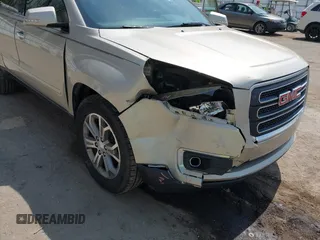 2015 GMC Acadia SLT z VIN 1GKKRSKD2FJ158888, wystawiony jako IAAI lot #42116752 z przebiegiem 156 778 mil mil oraz . Historia ofert i sprzedaży dostępna na DreamBid. Obrazek 6.