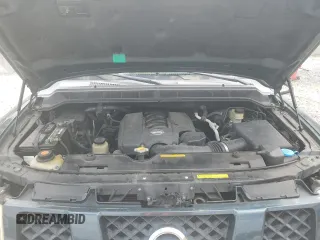 2006 Nissan Armada LE z VIN 5N1AA08A66N704984, wystawiony jako Copart lot #53643095 z przebiegiem 217 337 mil mil oraz Szkoda całkowita • Salvage title. Historia ofert i sprzedaży dostępna na DreamBid. Obrazek 12.