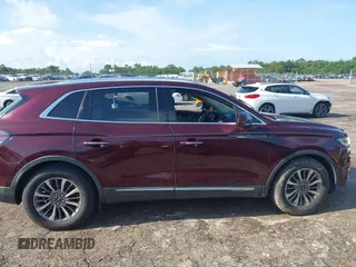 2020 Lincoln Nautilus Reserve with VIN 2LMPJ6K94LBL29717, listed as a IAAI auction lot 42388863 with Not provided miles and . Bid and sale history available at DreamBid. Image 12.
