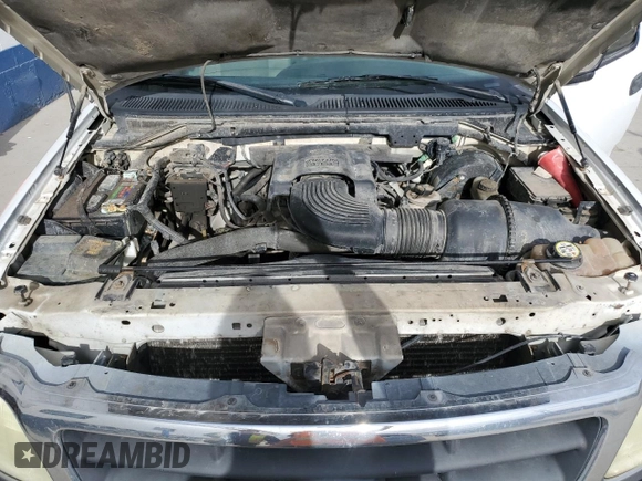 2003 Ford F-150 XL with VIN 2FTRF18W53CA04398, listed as a Copart auction lot 42981485 with 244,706 mi miles and Salvage title. Bid and sale history available at DreamBid. Image 11.