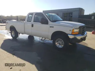 2001 Ford F-250 XL with VIN 1FTNX21L31EA53026, listed as a Copart auction lot 75316914 with 288,919 mi miles and Salvage title. Bid and sale history available at DreamBid. Image 4.