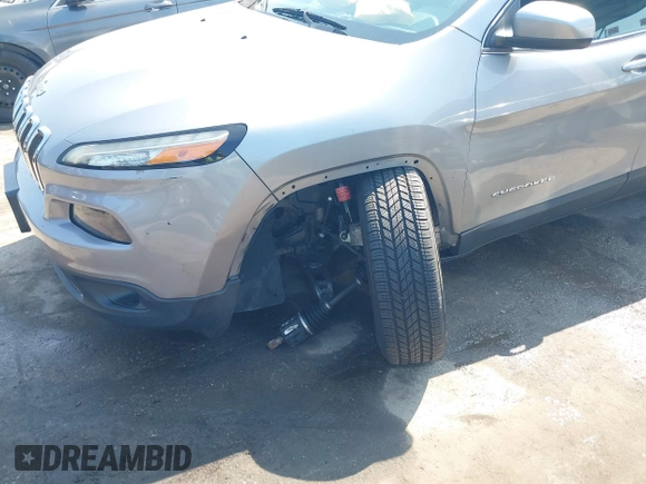 2015 Jeep Cherokee Latitude with VIN 1C4PJMCS2FW789144, listed as a IAAI auction lot 42837222 with 99,759 mi miles and . Bid and sale history available at DreamBid. Image 6.