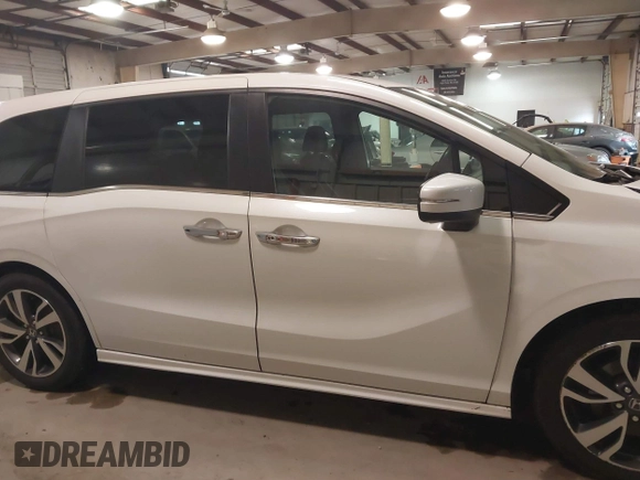 2021 Honda Odyssey Touring with VIN 5FNRL6H80MB026908, listed as a IAAI auction lot 41564765 with 116,453 mi miles. Bid and sale history available at carsss.com. Image 13.