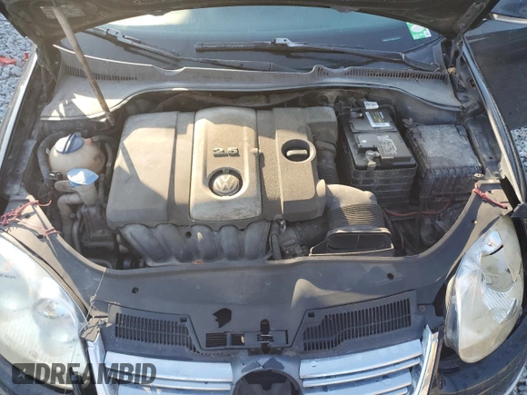 2009 Volkswagen Jetta SE z VIN 3VWRZ71K99M166918, wystawiony jako Copart lot #55511655 z przebiegiem 212 200 mil mil oraz Szkoda całkowita • Salvage title. Historia ofert i sprzedaży dostępna na DreamBid. Obrazek 11.
