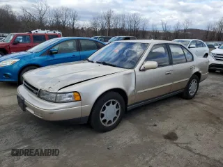1990 Nissan Maxima z VIN JN1HJ01P8LT402950, wystawiony jako Copart lot #82714734 z przebiegiem 60 727 mil mil oraz Tytuł czysty. Historia ofert i sprzedaży dostępna na DreamBid. Obrazek 1.
