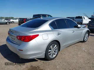 2015 Infiniti Q50 with VIN JN1BV7AR3FM405659, listed as a IAAI auction lot 41949596 with 101,196 mi miles and . Bid and sale history available at DreamBid. Image 4.