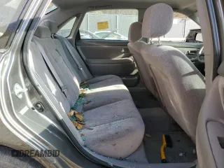 2004 Toyota Avalon XL z VIN 4T1BF28B74U351295, wystawiony jako Copart lot #78364424 z przebiegiem 129 130 mil mil oraz Szkoda całkowita • Salvage title. Historia ofert i sprzedaży dostępna na DreamBid. Obrazek 10.