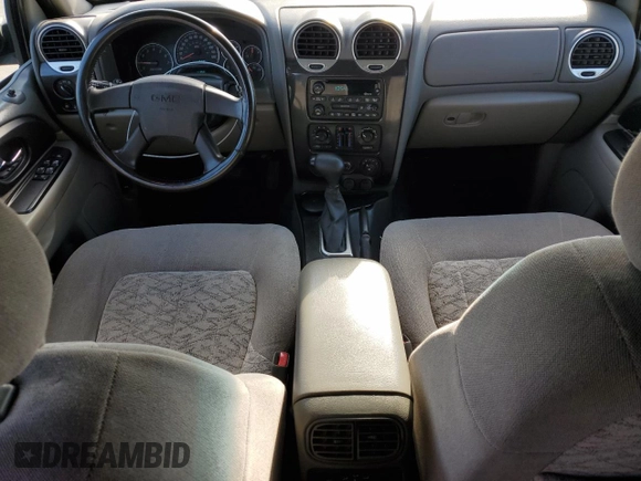 2002 GMC Envoy SLT with VIN 1GKDS13S022298186, listed as a Copart auction lot 87639455 with 50,050 mi miles and Salvage Title. Bid and sale history available at carsss.com. Image 8.