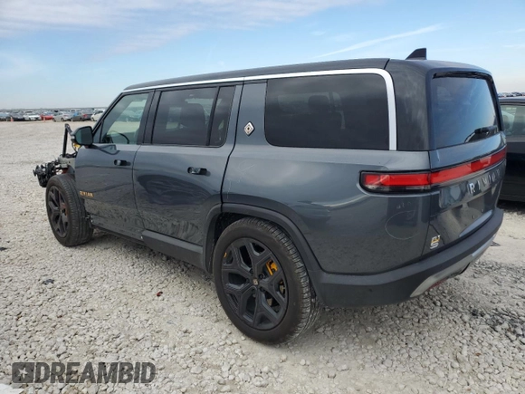 2022 Rivian R1S Launch Edition with VIN 7PDSGABL3NN000739, listed as a Copart auction lot 88127995 with 12,143 mi miles and Salvage Title. Bid and sale history available at DreamBid. Image 2.