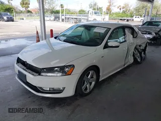 2015 Volkswagen Passat 1.8T Limited Edition with VIN 1VWAT7A3XFC100852, listed as a IAAI auction lot 41204902 with 85,725 mi miles. Bid and sale history available at carsss.com. Image 17.