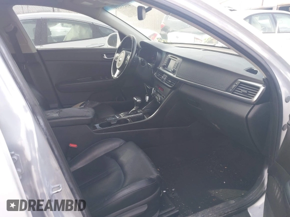 2016 Kia Optima EX with VIN 5XXGU4L39GG041624, listed as a IAAI auction lot 41653133 with 130,312 mi miles. Bid and sale history available at carsss.com. Image 5.