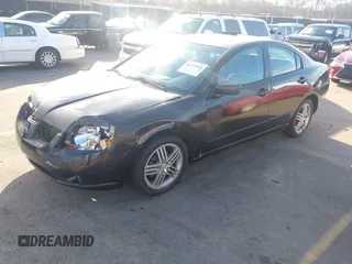 2004 Mitsubishi Galant ES with VIN 4A3AB36F74E077627, listed as a IAAI auction lot 41734910 with 196,299 mi miles. Bid and sale history available at carsss.com. Image 2.