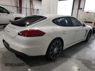 2016 Porsche Panamera 4 z VIN WP0AA2A71GL001868, wystawiony jako Copart lot #55299865 z przebiegiem 188 141 mil mil oraz Czysty tytuł • Clean title. Historia ofert i sprzedaży dostępna na DreamBid. Obrazek 3.