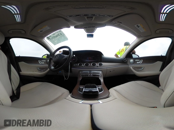 2018 Mercedes-Benz E 300 with VIN WDDZF4JB7JA357139, listed as a IAAI auction lot 42065511 with 54,812 mi miles and . Bid and sale history available at DreamBid. Image 18.