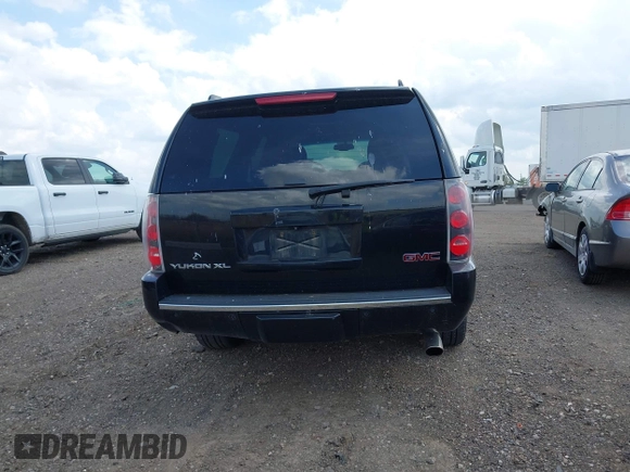 2013 GMC Yukon XL Denali with VIN 1GKS2MEF8DR350974, listed as a IAAI auction lot 42157560 with 285,848 mi miles and . Bid and sale history available at DreamBid. Image 16.