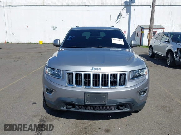 2016 Jeep Grand Cherokee Laredo z VIN 1C4RJFAG7GC392261, wystawiony jako IAAI lot #41890922 z przebiegiem 107 546 mil mil oraz . Historia ofert i sprzedaży dostępna na DreamBid. Obrazek 12.