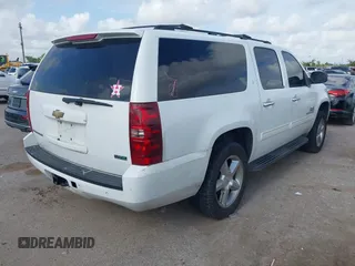 2011 Chevrolet Suburban LT with VIN 1GNSCJE09BR150452, listed as a IAAI auction lot 42655961 with 208,311 mi miles and . Bid and sale history available at DreamBid. Image 4.