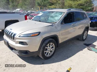 2014 Jeep Cherokee Latitude z VIN 1C4PJMCS3EW197492, wystawiony jako IAAI lot #42216470 z przebiegiem 125 156 mil mil oraz . Historia ofert i sprzedaży dostępna na DreamBid. Obrazek 2.
