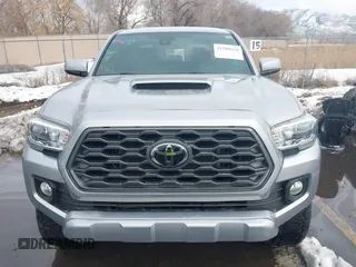 2021 Toyota Tacoma SR z VIN 3TMCZ5AN0MM386867, wystawiony jako IAAI lot #41580426 z przebiegiem 46 559 mil mil oraz . Historia ofert i sprzedaży dostępna na DreamBid. Obrazek 12.