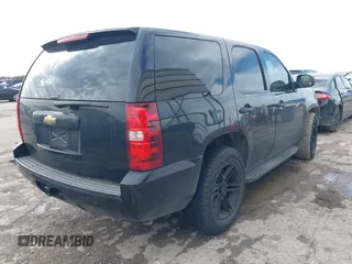 2011 Chevrolet Tahoe Commercial with VIN 1GNLC2E00BR325388, listed as a IAAI auction lot 41472731 with 265,781 mi miles and . Bid and sale history available at DreamBid. Image 4.