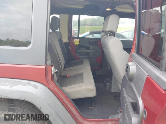 2008 Jeep Wrangler Unlimited X with VIN 1J4GA39108L606685, listed as a IAAI auction lot 41965538 with 288,946 mi miles. Bid and sale history available at carsss.com. Image 8.