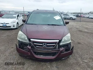2007 Honda Odyssey Touring with VIN 5FNRL38847B048235, listed as a IAAI auction lot 41963652 with 176,412 mi miles. Bid and sale history available at carsss.com. Image 12.