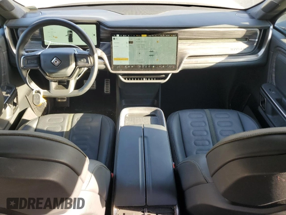 2022 Rivian R1T Launch Edition z VIN 7FCTGAAL6NN002704, wystawiony jako Copart lot #77913144 z przebiegiem 40 665 mil mil oraz Szkoda całkowita • Salvage title. Historia ofert i sprzedaży dostępna na DreamBid. Obrazek 8.