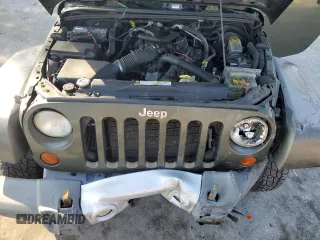 2008 Jeep Wrangler Unlimited Sahara with VIN 1J4GA59198L566019, listed as a Copart auction lot 53975965 with 184,612 mi miles and Salvage Title. Bid and sale history available at carsss.com. Image 12.