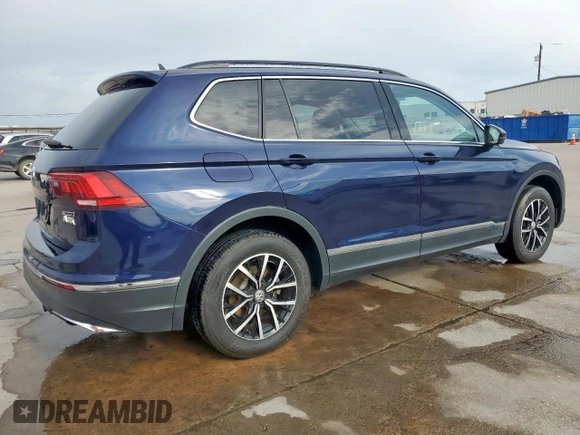 2021 Volkswagen Tiguan SE with VIN 3VV2B7AX6MM051899, listed as a Copart auction lot 62870765 with 56,848 mi miles and Clean title. Bid and sale history available at DreamBid. Image 3.