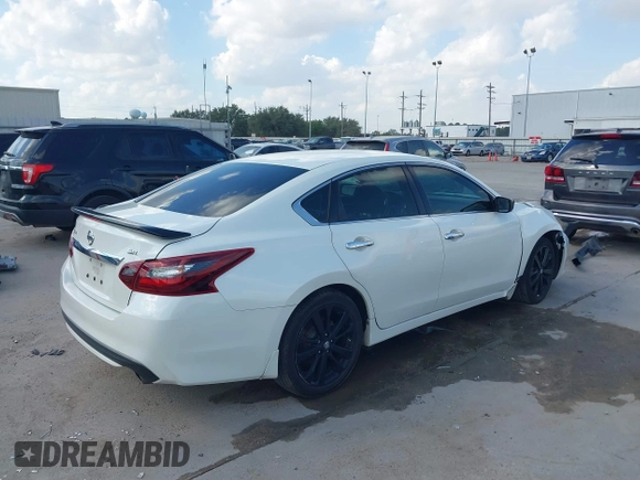 2017 Nissan Altima SV z VIN 1N4AL3AP3HC476185, wystawiony jako IAAI lot #40580202 z przebiegiem 118 710 mil mil oraz . Historia ofert i sprzedaży dostępna na DreamBid. Obrazek 4.