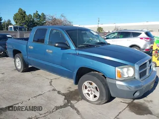2005 Dodge Dakota SLT with VIN 1D7HE48K85S218934, listed as a IAAI auction lot 41514011 with 122,063 mi miles. Bid and sale history available at carsss.com. Image 1.