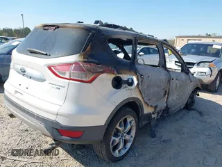 2015 Ford Escape Titanium с VIN 1FMCU9J90FUA48002, выставлен на аукционе IAAI как лот 41890275 с пробегом Не указан миль и . История ставок и продаж доступна на DreamBid. Изображение 4.