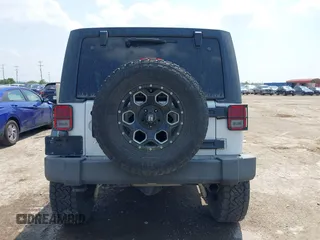 2012 Jeep Wrangler Unlimited Sport with VIN 1C4BJWDG7CL273102, listed as a IAAI auction lot 42288975 with 155,153 mi miles and . Bid and sale history available at DreamBid. Image 17.