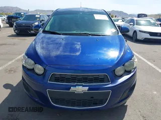 2014 Chevrolet Sonic LT with VIN 1G1JC6SB0E4205646, listed as a IAAI auction lot 41925745 with 84,102 mi miles. Bid and sale history available at carsss.com. Image 12.