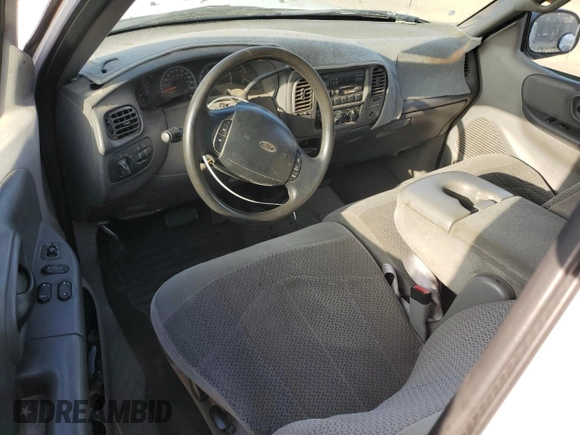 1999 Ford F-150 XL with VIN 1FTRX17L6XNA06844, listed as a Copart auction lot 83109004 with Not Provided miles and Salvage Title. Bid and sale history available at carsss.com. Image 8.