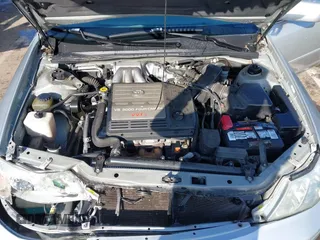 2001 Toyota Avalon XL z VIN 4T1BF28B51U189775, wystawiony jako IAAI lot #41970356 z przebiegiem 247 969 mil mil oraz . Historia ofert i sprzedaży dostępna na DreamBid. Obrazek 10.