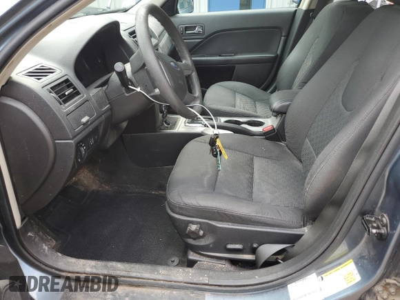 2012 Ford Fusion SE with VIN 3FAHP0HAXCR253493, listed as a Copart auction lot 63565455 with 126,582 mi miles and Salvage title. Bid and sale history available at DreamBid. Image 7.