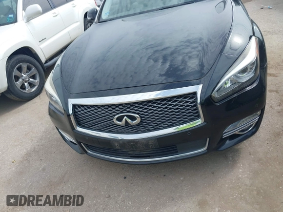 2015 Infiniti Q70 with VIN JN1BY1PP9FM601468, listed as a IAAI auction lot 41745618 with 138,932 mi miles and . Bid and sale history available at DreamBid. Image 12.