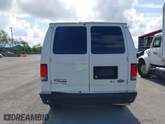 2014 Ford Econoline Cargo Commercial with VIN 1FTNE2EW8EDA99716, listed as a IAAI auction lot 42766089 with 229,212 mi miles and . Bid and sale history available at DreamBid. Image 16.