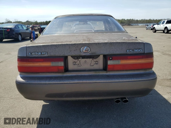 1996 Lexus ES 300 z VIN JT8BF12G3T0149822, wystawiony jako Copart lot #53803495 z przebiegiem 53 648 mil mil oraz Czysty tytuł • Clean title. Historia ofert i sprzedaży dostępna na DreamBid. Obrazek 6.