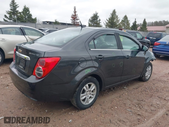 2014 Chevrolet Sonic LT with VIN 1G1JC5SH1E4236385, listed as a IAAI auction lot 42066948 with 126,200 mi miles and . Bid and sale history available at DreamBid. Image 4.
