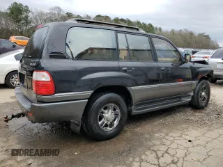 2001 Lexus LX 470 z VIN JTJHT00W613503074, wystawiony jako Copart lot #51959475 z przebiegiem Nie podano mil oraz Nie do naprawy. Historia ofert i sprzedaży dostępna na DreamBid. Obrazek 3.