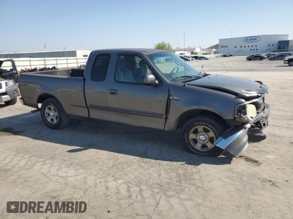 2002 Ford F-150 XL with VIN 1FTRX17222KA58070, listed as a Copart auction lot 52186295 with 0 mi miles and Salvage Title. Bid and sale history available at carsss.com. Image 4.