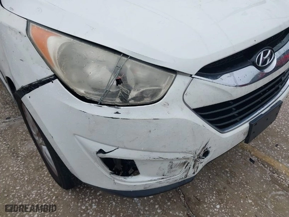 2013 Hyundai Tucson GLS with VIN KM8JU3AC8DU599937, listed as a IAAI auction lot 41398687 with 207,048 mi miles. Bid and sale history available at carsss.com. Image 16.