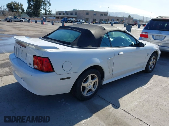 2004 Ford Mustang Deluxe with VIN 1FAFP44654F181293, listed as a IAAI auction lot 41831366 with 122,636 mi miles. Bid and sale history available at carsss.com. Image 4.