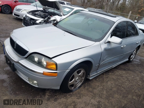 2002 Lincoln LS w/Base Pkg with VIN 1LNHM87A12Y607979, listed as a IAAI auction lot 41523445 with 174,826 mi miles. Bid and sale history available at carsss.com. Image 2.