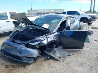 2022 Tesla Model Y Long Range z VIN 7SAYGDEE8NF443194, wystawiony jako IAAI lot #42259205 z przebiegiem 38 540 mil mil oraz . Historia ofert i sprzedaży dostępna na DreamBid. Obrazek 17.